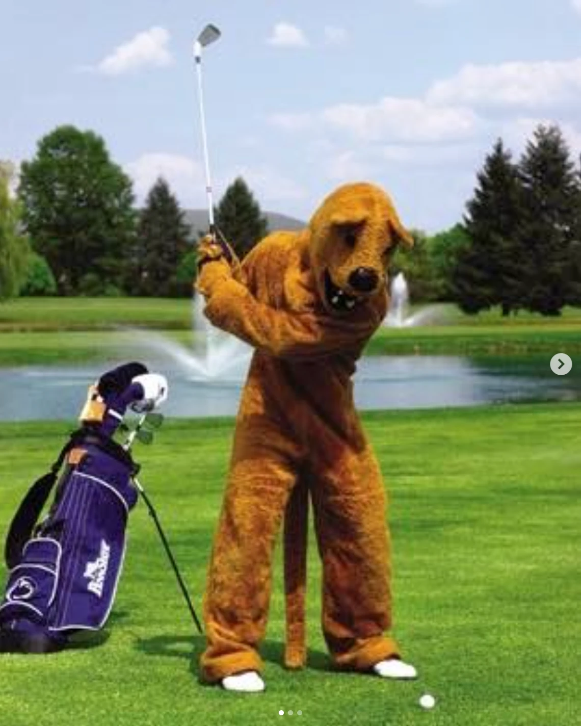 The Penn State Nittany Lion mascot mid-swing on a golf course, posted on Instagram